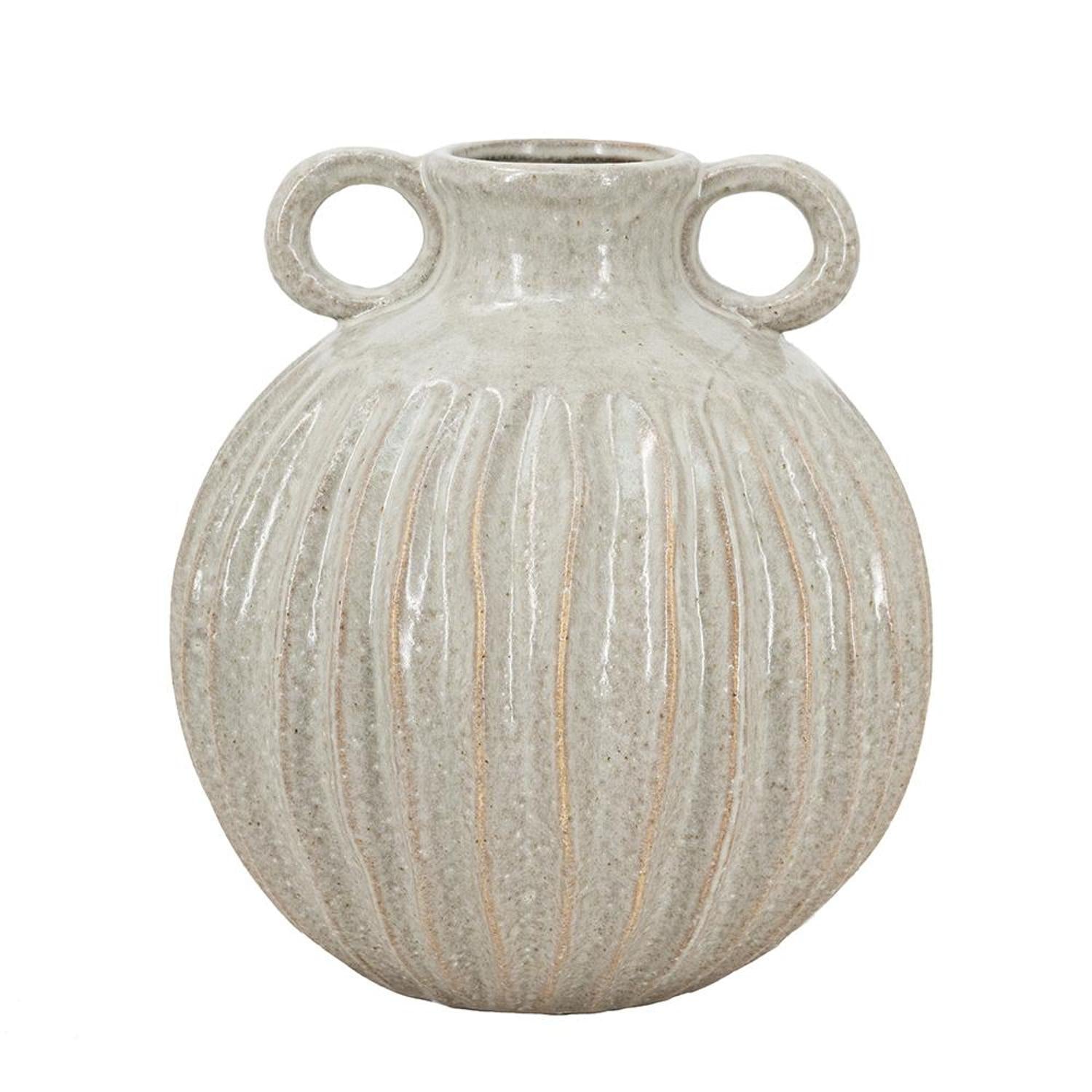 Decorative vase with ribbed texture and two handles on a white background