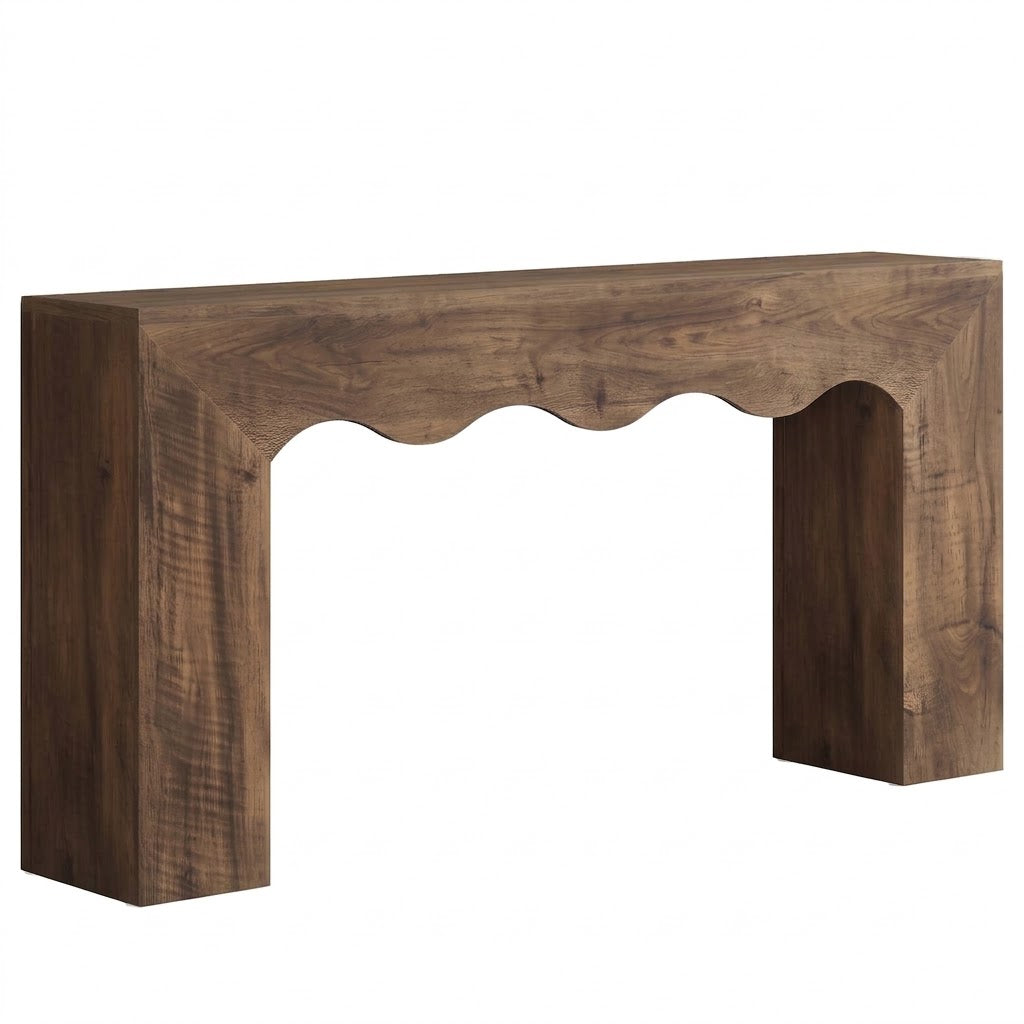 A rustic dark brown wooden console table with a scalloped apron and blocky legs, shown against a plain white background.