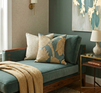 Cozy living room with a teal sofa, decorative pillows, and a side table.