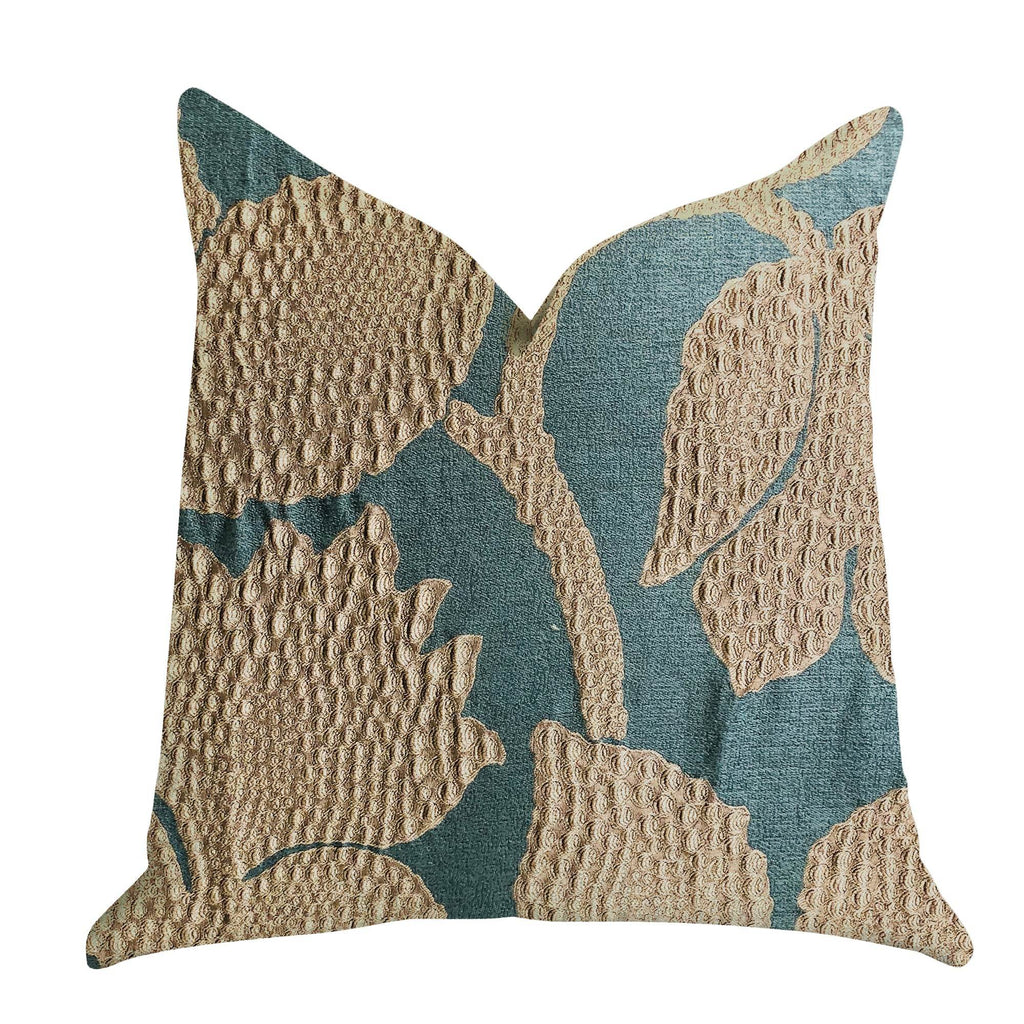 Decorative pillow with textured teal green and gold leaf pattern on a white background