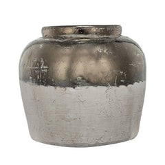 Decorative vase with a metallic finish on a white background