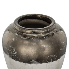 Vintage-style ceramic vase with a textured surface on a white background