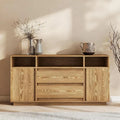 Wooden sideboard with decorative items against a neutral wall