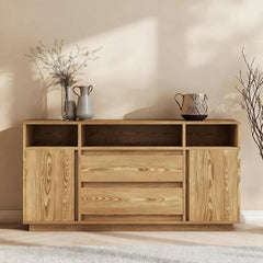 Wooden sideboard with decorative items against a neutral wall