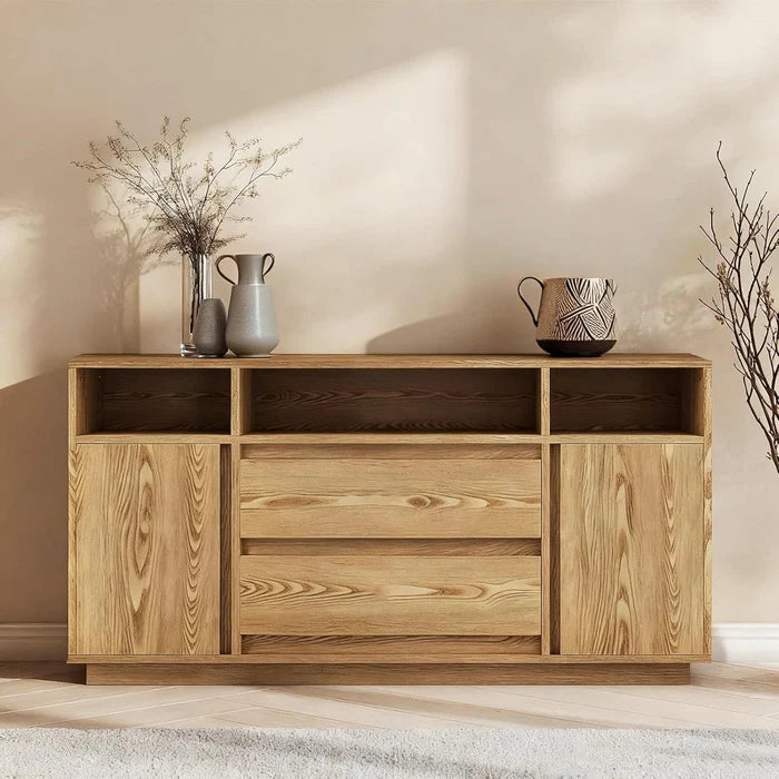 Wooden sideboard with decorative items against a neutral wall